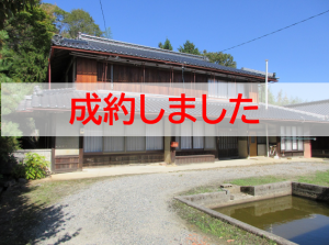 成約